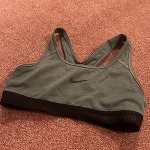 Grey Nike Pro-Racerback sports bra with black elastic band